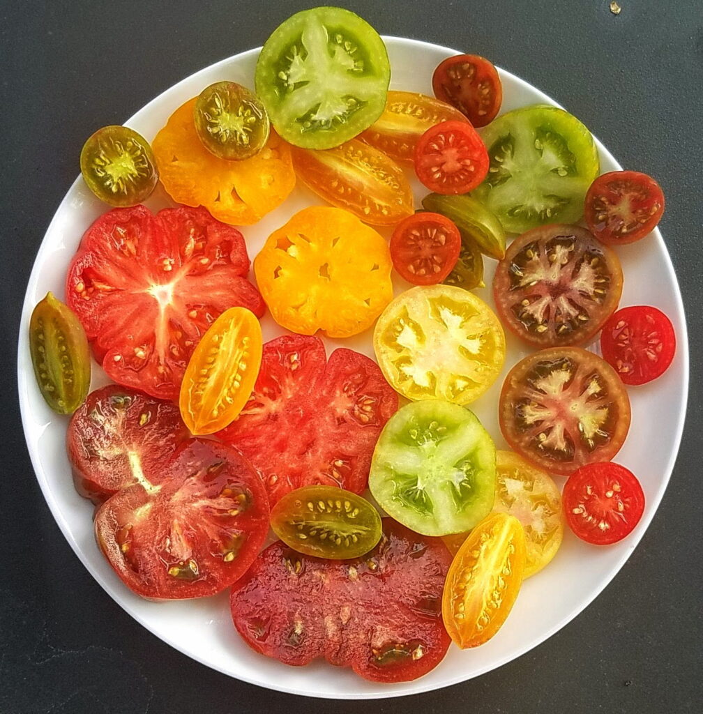 Heirloom tomatoes cut and ready for a tomato tart | The Coeur d'Alene Coop