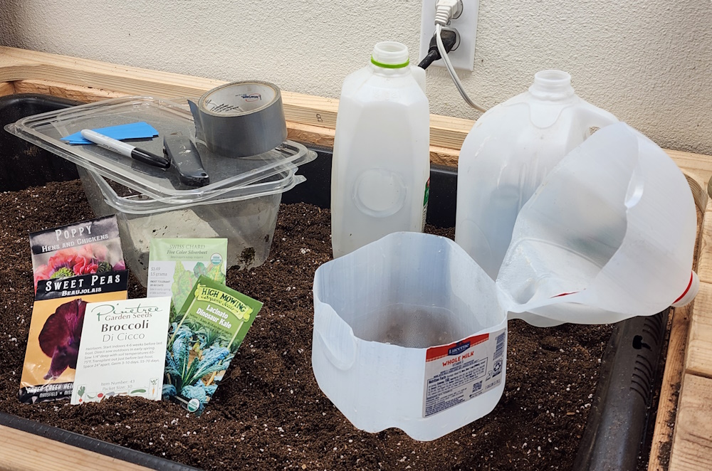 winterr sowing supplies include recycled milk jugs, seeds, duct tape, soil, plant labels, marker, and a box knife.