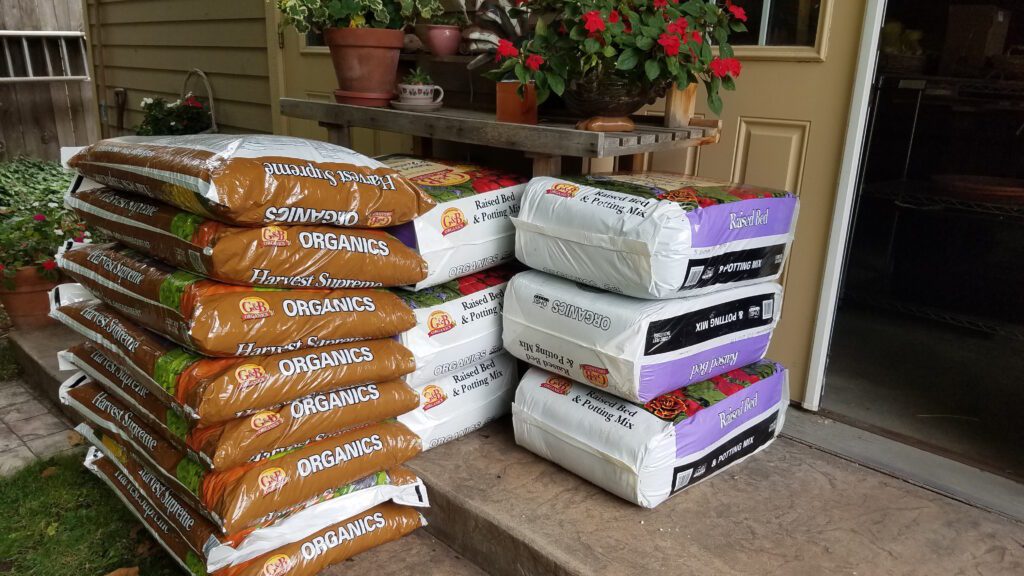 stacks of bagged soil